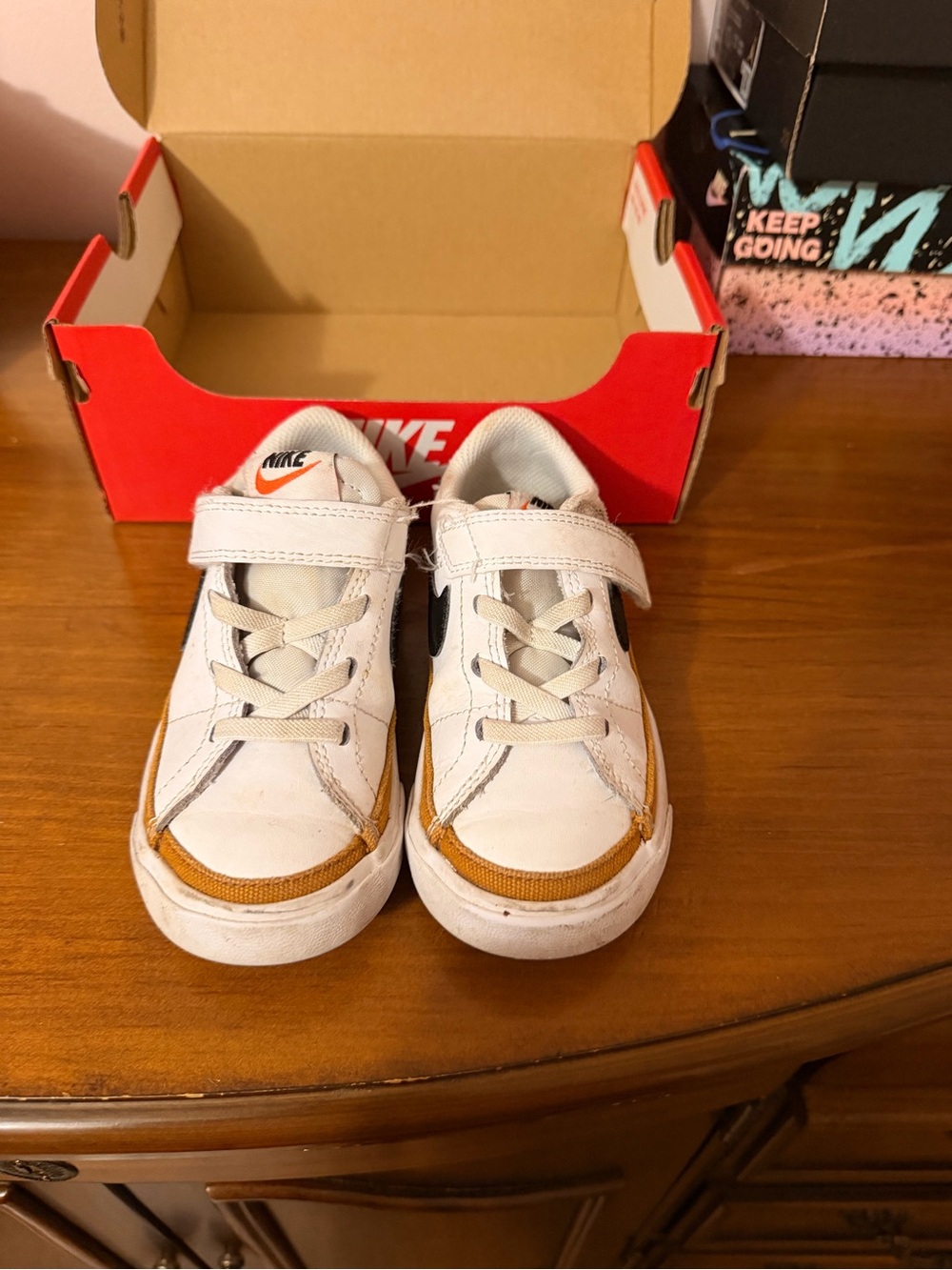 Nike Kids White and Tan Low-Top Sneakers with Black Swoosh